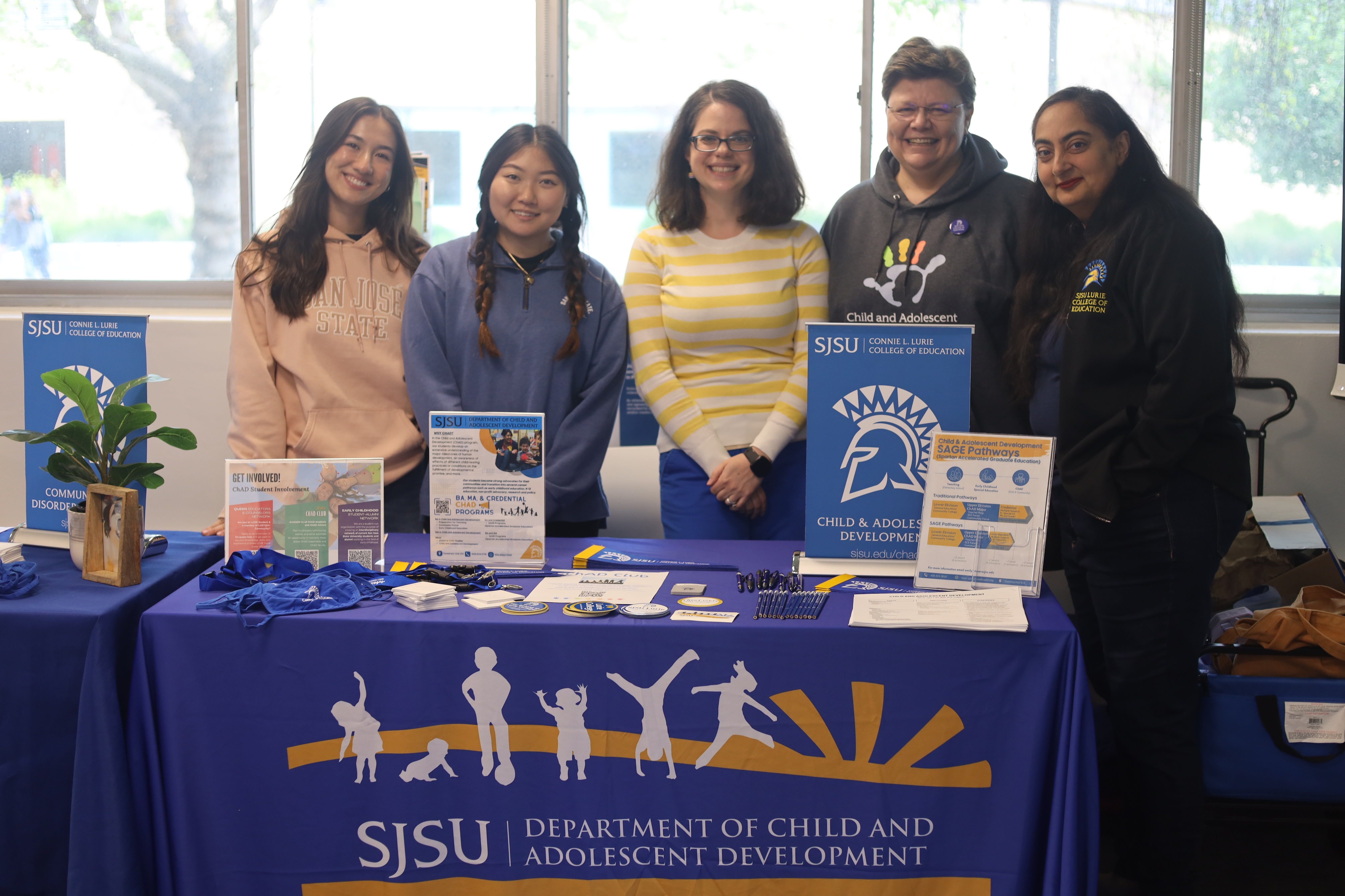 ChAD graduate students at a tabling event posing for a picture