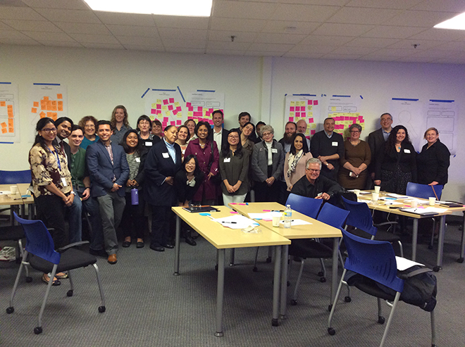 Picture of a large group of members of the SVSILN in a classroom.